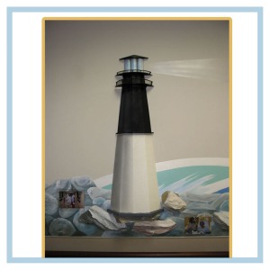 lighthouse-rocks-waves-hospital-design-healthcare-art-tropcial-nautical-theme