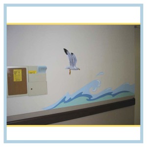 tropical-theme-waves-down-hallway-3d-bird-healthcare-design-hospital-childrens-areas-art