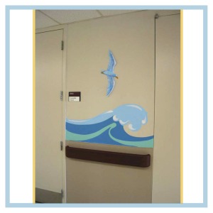 tropical-theme-waves-down-hallway-3d-bird-healthcare-design-hospital-childrens-areas-art-doctors-office