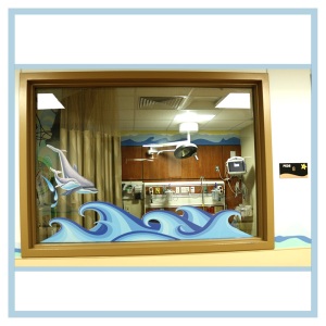 dolphin-decal-on-window-waves-mural-hospital-art-healthcare-design