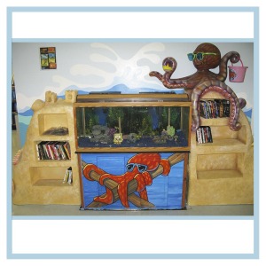 aquaiium-with-octopus-and-bookcase-hospital-design-healthcare-art