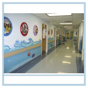 hospital-hallway-art-porthole-frames-with-pictures-of-staff-healthcare-design-waves-3d-fish