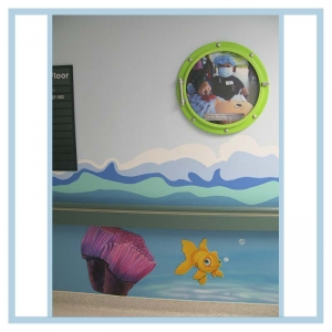 porthole-frame-prints-wall-art-waves-in-hallway-healthcare-design-hospital-childrens-images