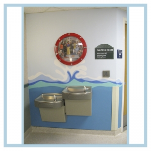 porthole-frame-prints-wall-art-waves-in-hallway-healthcare-design-hospital-decorations