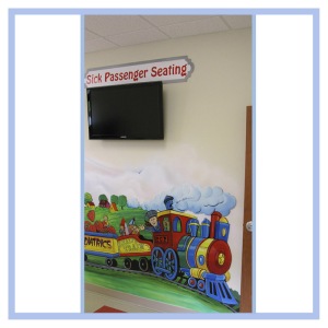 sick-patient-seating-train-theme-healthcare-design-hospital-art