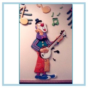 clown-playing-banjo-cancer-care-unit-hospital-design-wall-art